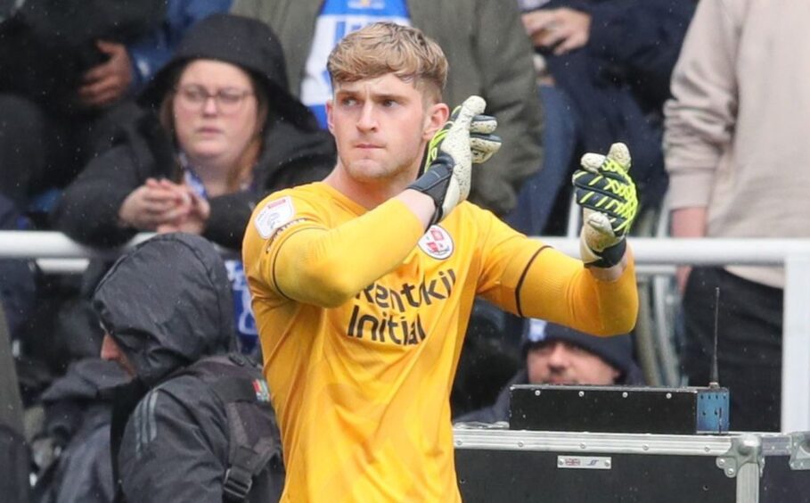 Toby Stewards applauds the Crawley fans.