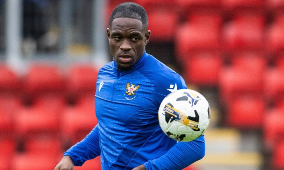 Uche Ikpeazu with his eye on the ball during a St Johnstone warm-up.