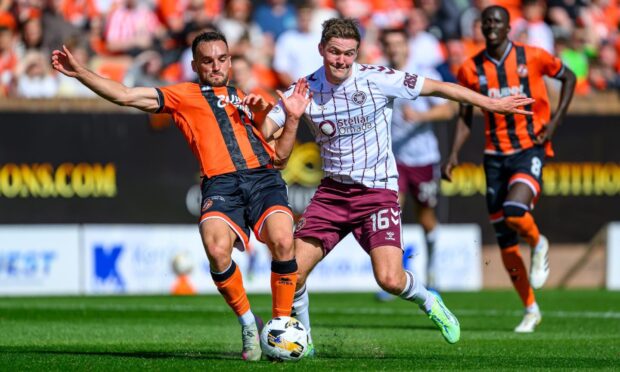Police are hunting a fan who threw a lighter from the George Fox stand on Sunday. Image: Malcolm Mackenzie/Hearts FC/ProSports/Shutterstock