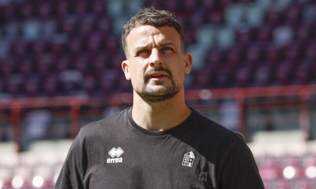 Dunfermline skipper Kyle Benedictus squints into the sun.