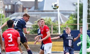 Dundee's Ryan Astley powers home a well-worked set-piece against Montrose. Image: Ross MacDonald/SNS