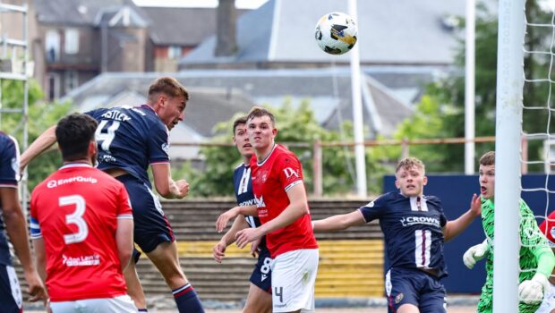 Dundee's Ryan Astley powers home a well-worked set-piece against Montrose. Image: Ross MacDonald/SNS