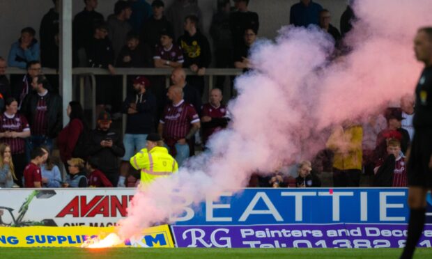 The match was temporarily stopped at Gayfield Park. Image: Paul Devlin / SNS Group