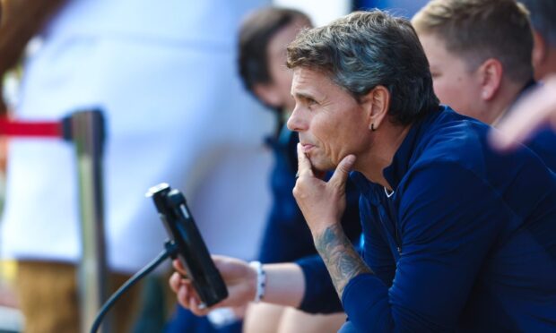 Simo Valakari deep in thought in the St Johnstone dugout.