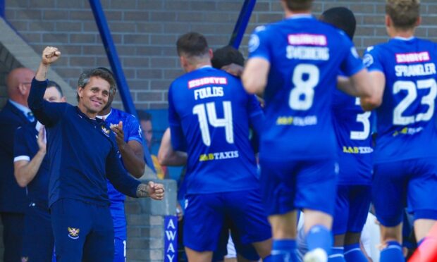 The St Johnstone team celebrate in front of Simo Valakari after Stevie Mallan scores to make it 5-1.
