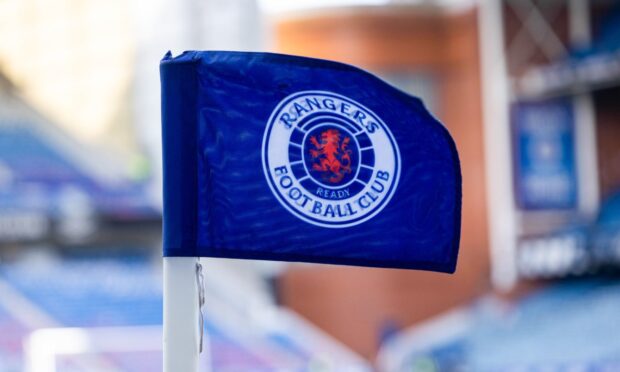 A picture of a flag with the Rangers badge on it.