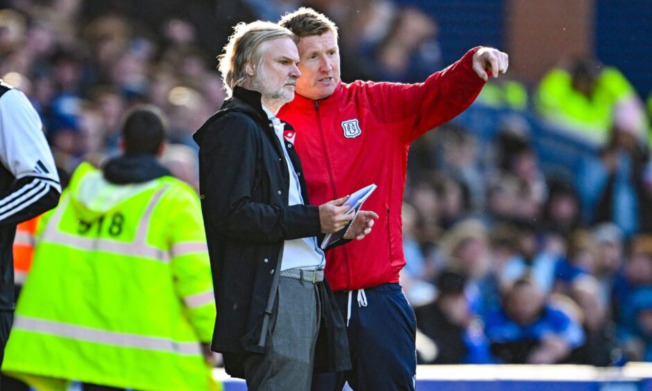Dundee head coach Steven Pressley and technical manager David Longwell in discussion