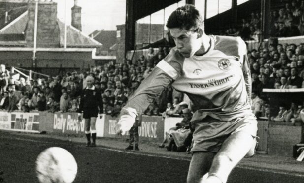 Sammy Johnston crosses a ball while playing for St Johnstone at Muirton Park.