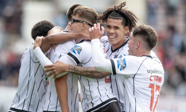 Dunfermline Athletic players help John Tod celebrate his stunning goal against Airdrie.