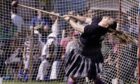 Heavyweight competitor Stacey Wilson gives her all at Bridge of Allan Highland Games 2025. Image: Phil Hannah