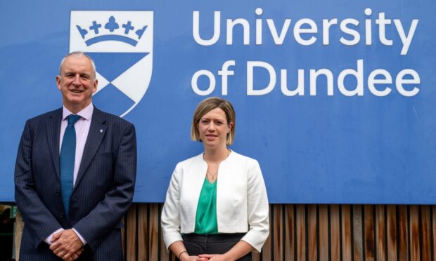 Interim Dundee University principal Professor Nigel Seaton and Education Secretary Jenny Gilruth.