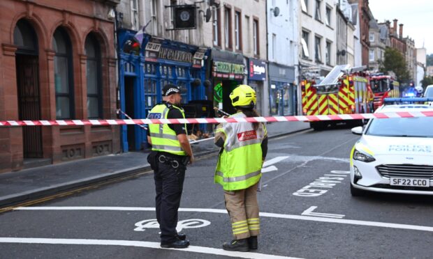 Police closed off the High Street for over two hours on Monday night. Image: Stuart Cowper