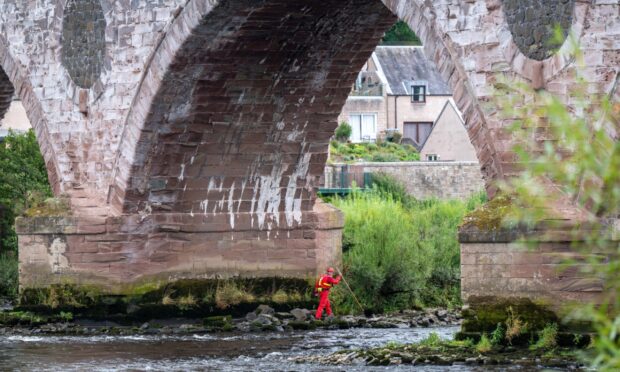 Search for missing person at Smeaton's Bridge in Perth.