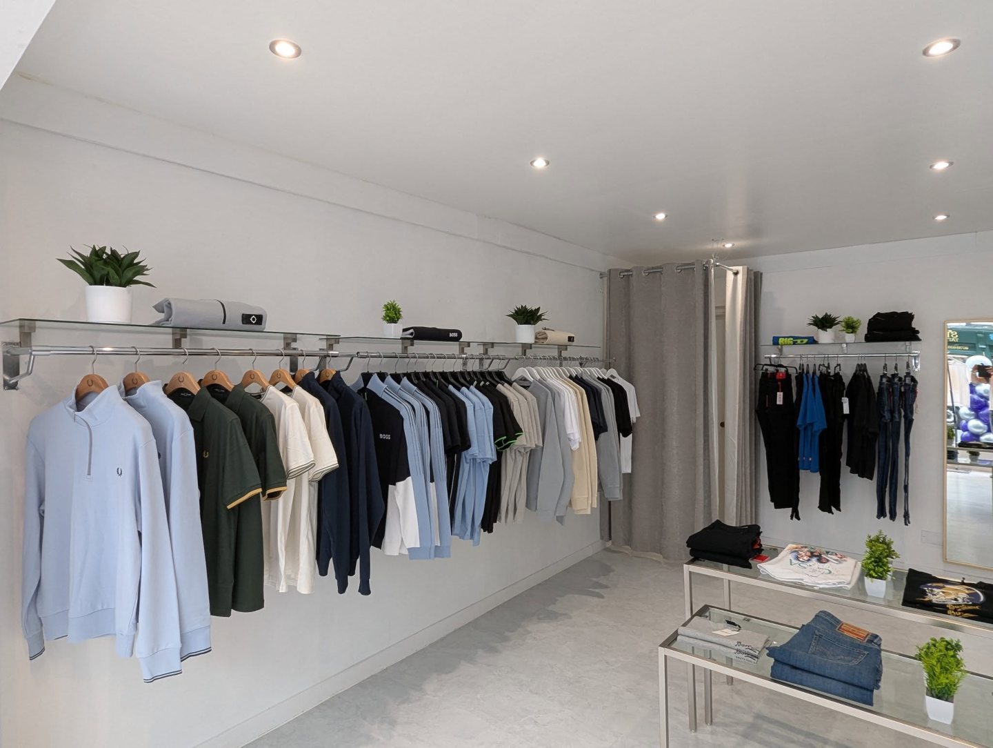 Clothing on the racks at Esquire Clothing.