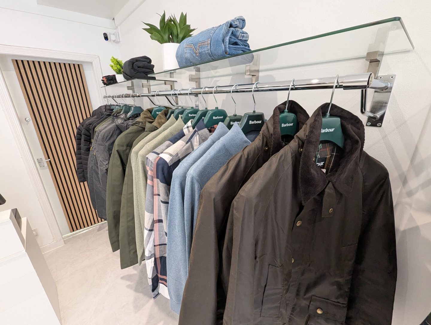 A rack of coats and jackets.