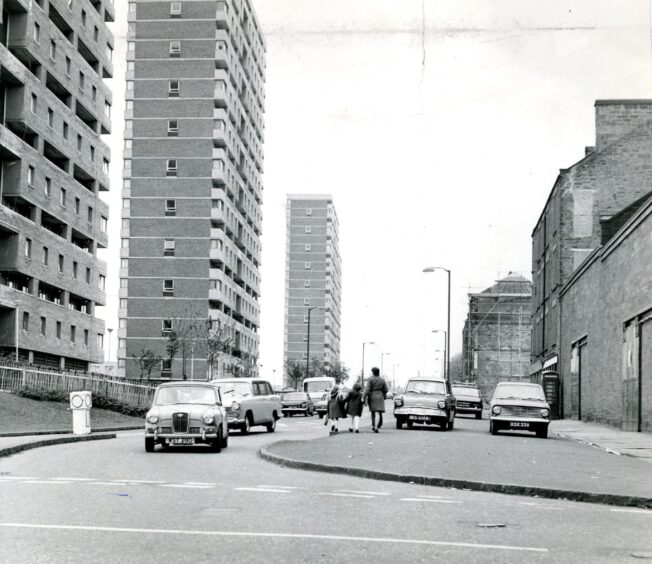 An adult and a couple of kids walking at the junction of Alexander Street/Hillbank Road in October 1974.
