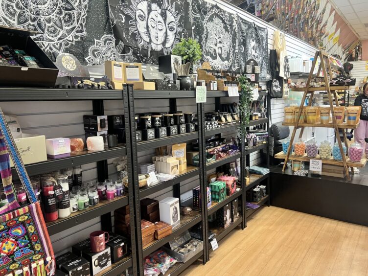 Packed shelves inside the shop.