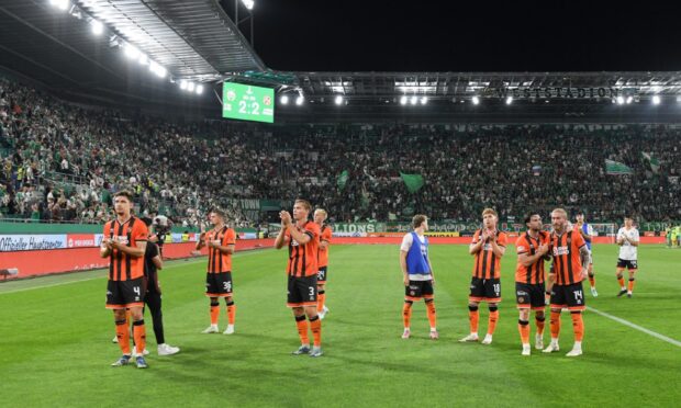 Dundee United's tireless stars take the acclaim of the fans.