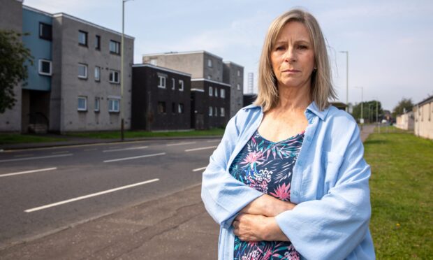 Lesley Lamb outside her flat on Craigie Drive. Image: Kenny Smith/DC Thomson