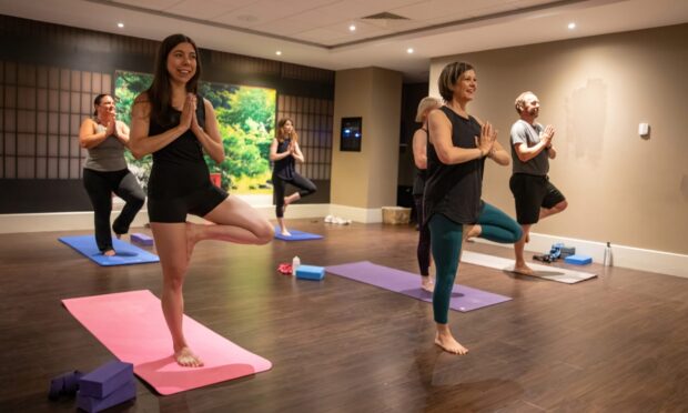 Courier journalist Poppy Watson tries out a yoga class at David Lloyd Dundee. Image: Kenny Smith/DC Thomson
