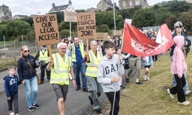 A protest march to Burntisland Harbour, involving hundreds of people
