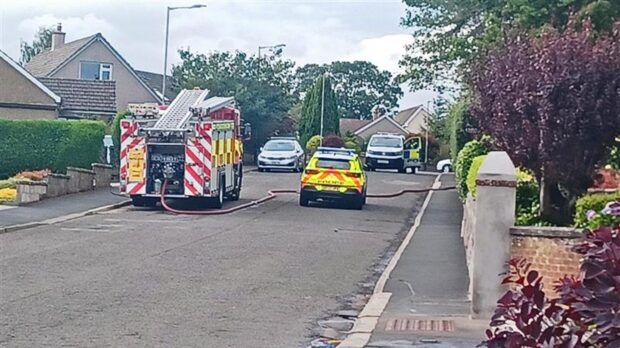Emergency services are at the scene on Kinnordy Road. Image: Lindsey Hamilton