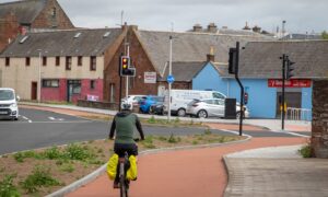 A cyclist on the new path near Arbroath harbour. Image: Steve Brown/DC Thomson