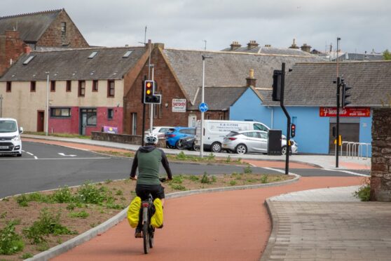 A cyclist on the new path near Arbroath harbour. Image: Steve Brown/DC Thomson