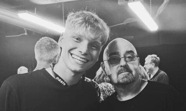 Montrose man Ben Walker with Oasis guitarist Paul 'Bonehead' Arthurs. Image: Ben Walker/Instagram