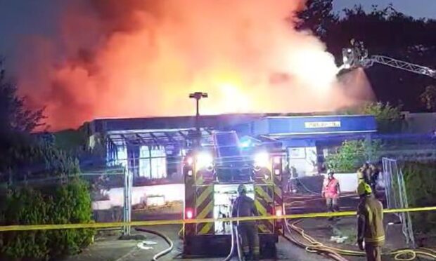 Firefighters at the former King Malcolm Hotel in Dunfermline.