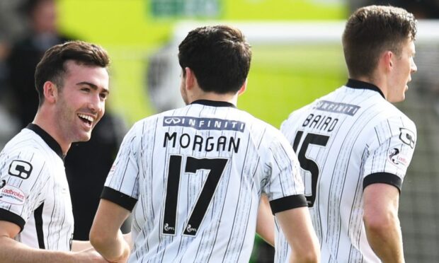 Stevie Mallan is congratulated for a St Mirren goal.