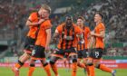 Dundee United players celebrate in Vienna.