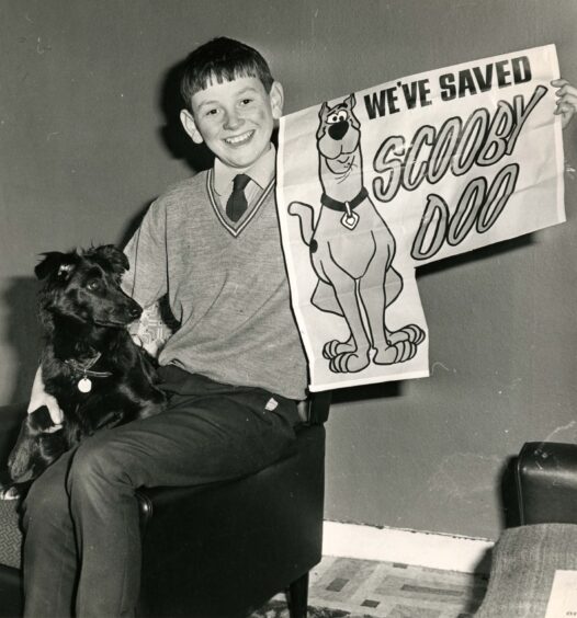 Scooby Doo cancellation protestor Jimmy Brown and his dog Nora in April 1971.