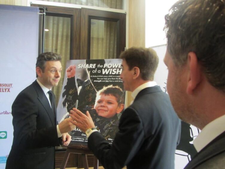 Michael Sheen chats to Tony Cochrane at the Critics' Choice Awards.