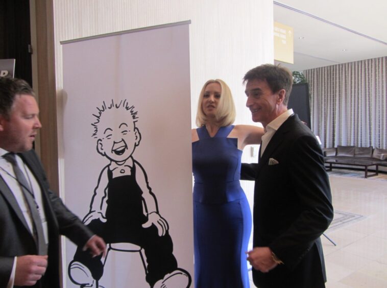 Bridesmaids actress Wendy McLendon-Covey meets Tony Cochrane in front of the pop-up banner. 