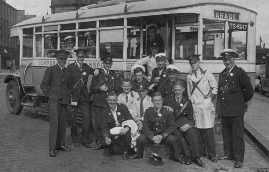 The crews pose for the photographer at Shore Terrace bus station in Dundee in 1932.