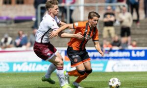 The Dundee United ace at heart of international tug-of-war