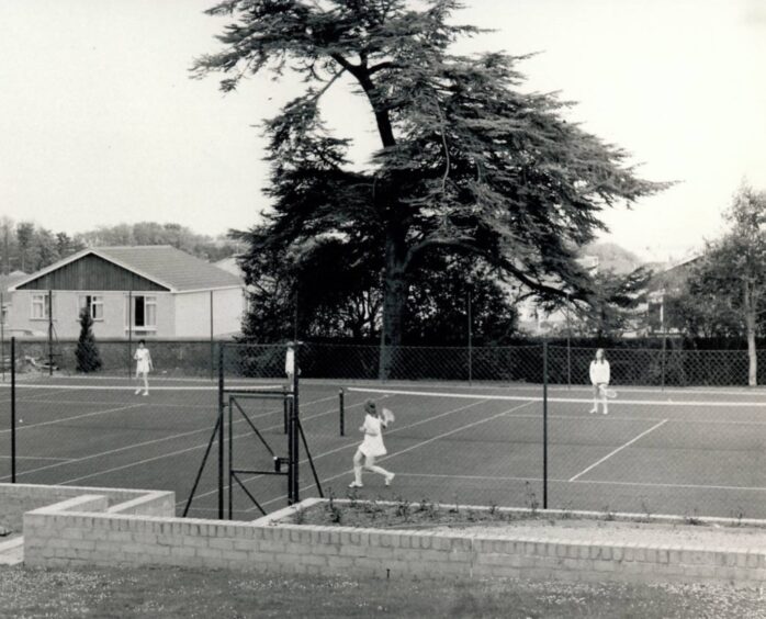 People playing tennis in Monifieth. 