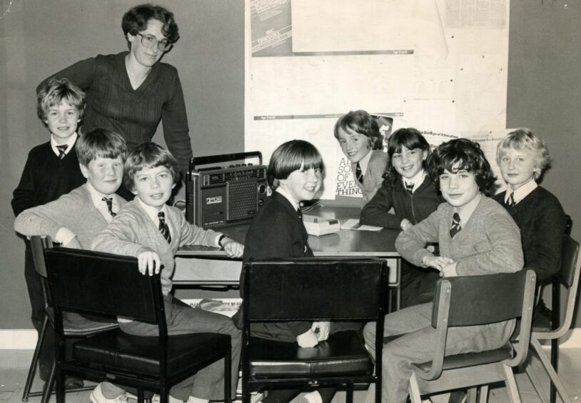 Teacher and pupils at Whitfield Primary. 