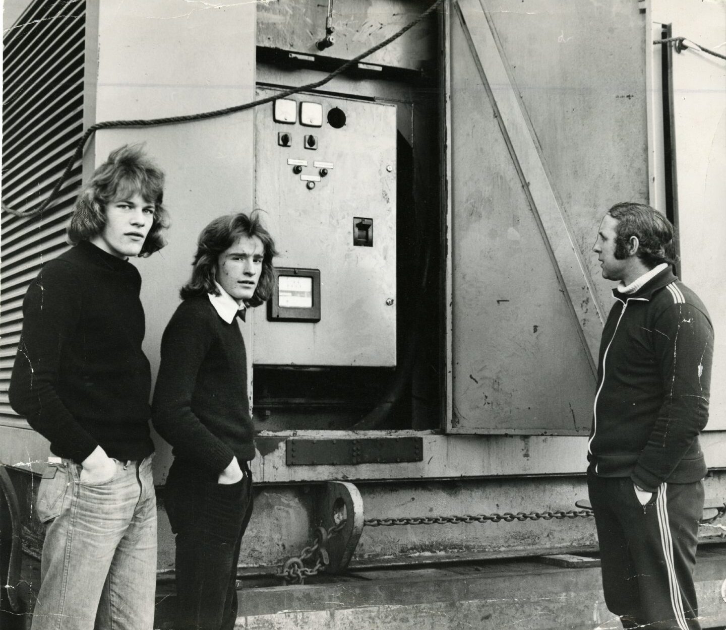 Players Andy Gray and Graeme Payne and manager Jim McLean beside a big generator at Tannadice in 1973. It was there to power the floodlights during the energy crisis in December 1973.