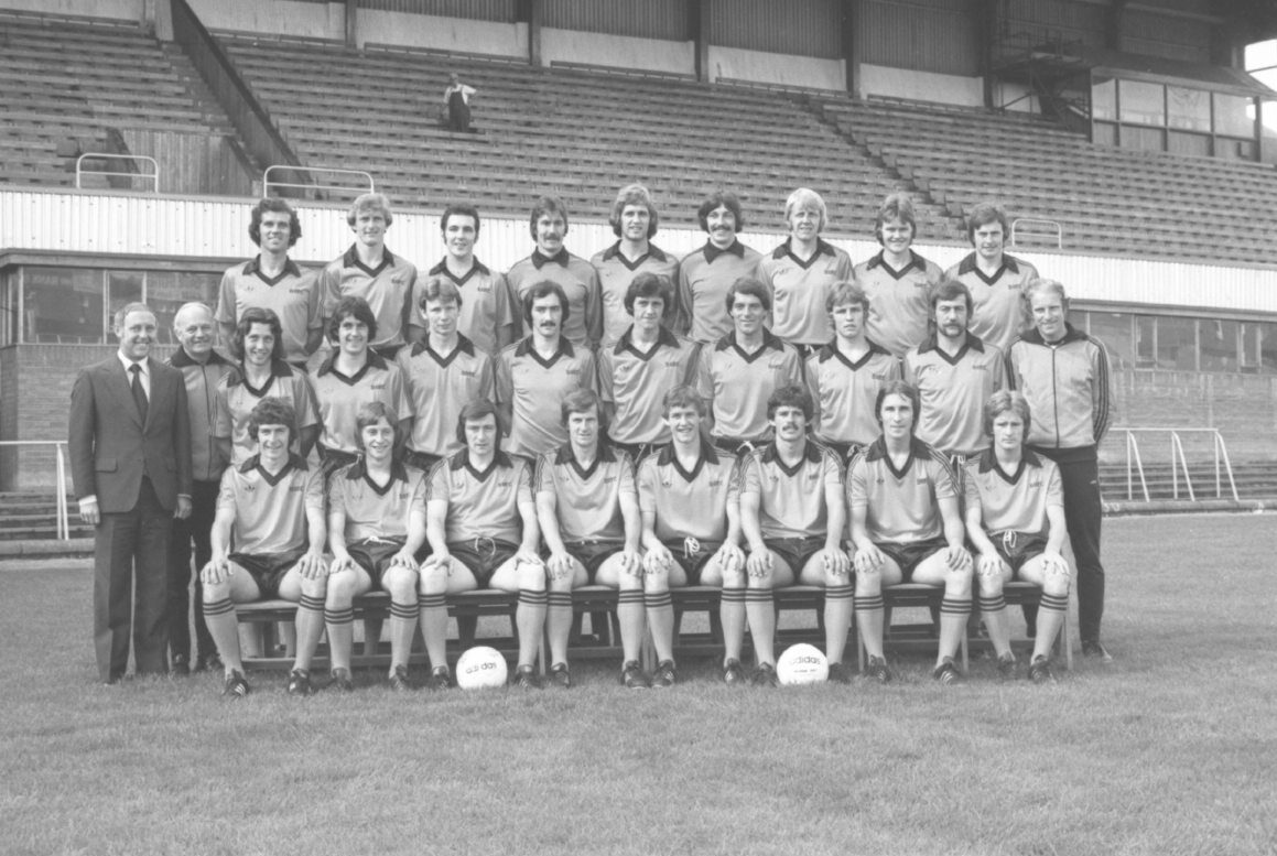 A smiling Jim McLean stands beside his players for the Dundee United squad photograph in 1977. They are pictured in front of the main stand.