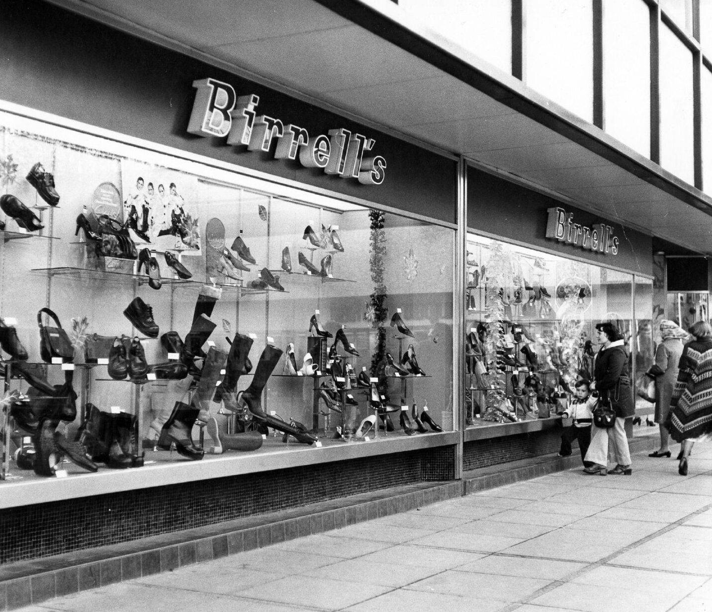 A busy shoe shop front.