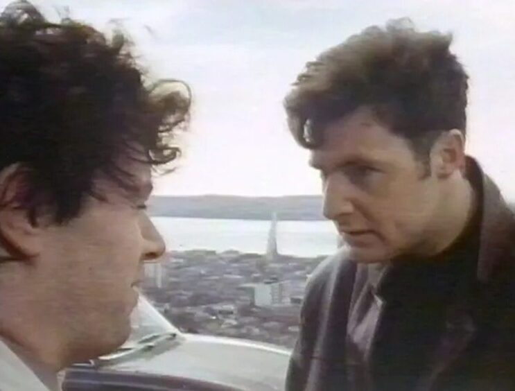 A scene from tv drama Jute City where the Tay Road Bridge and Dundee can be seen in the background.