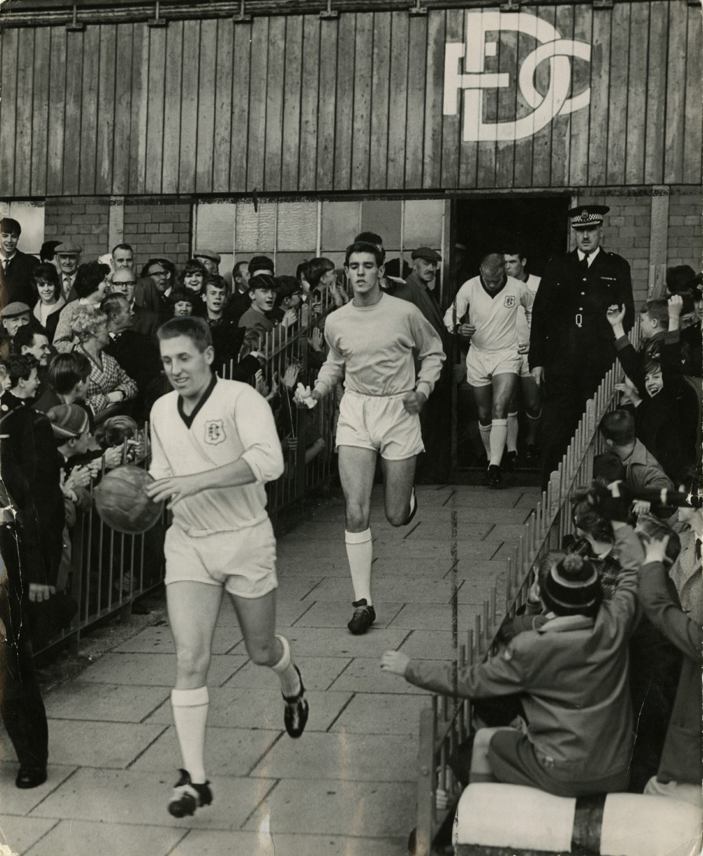 Skipper Hamilton leads out his team. 
