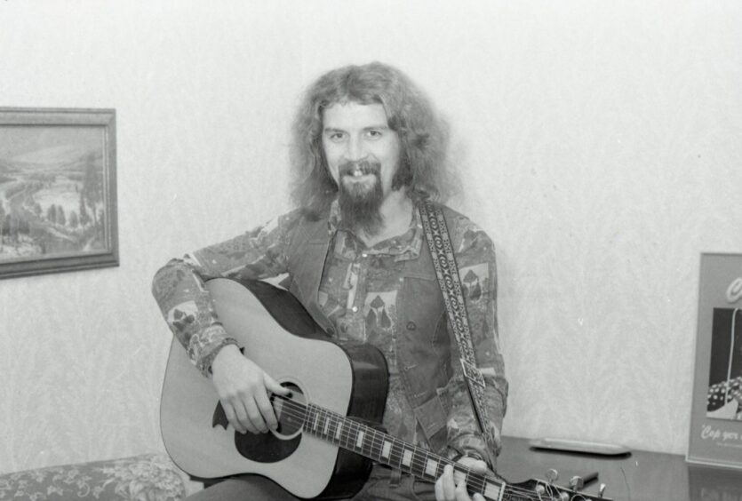 Billy Connolly with his guitar backstage in Dundee.