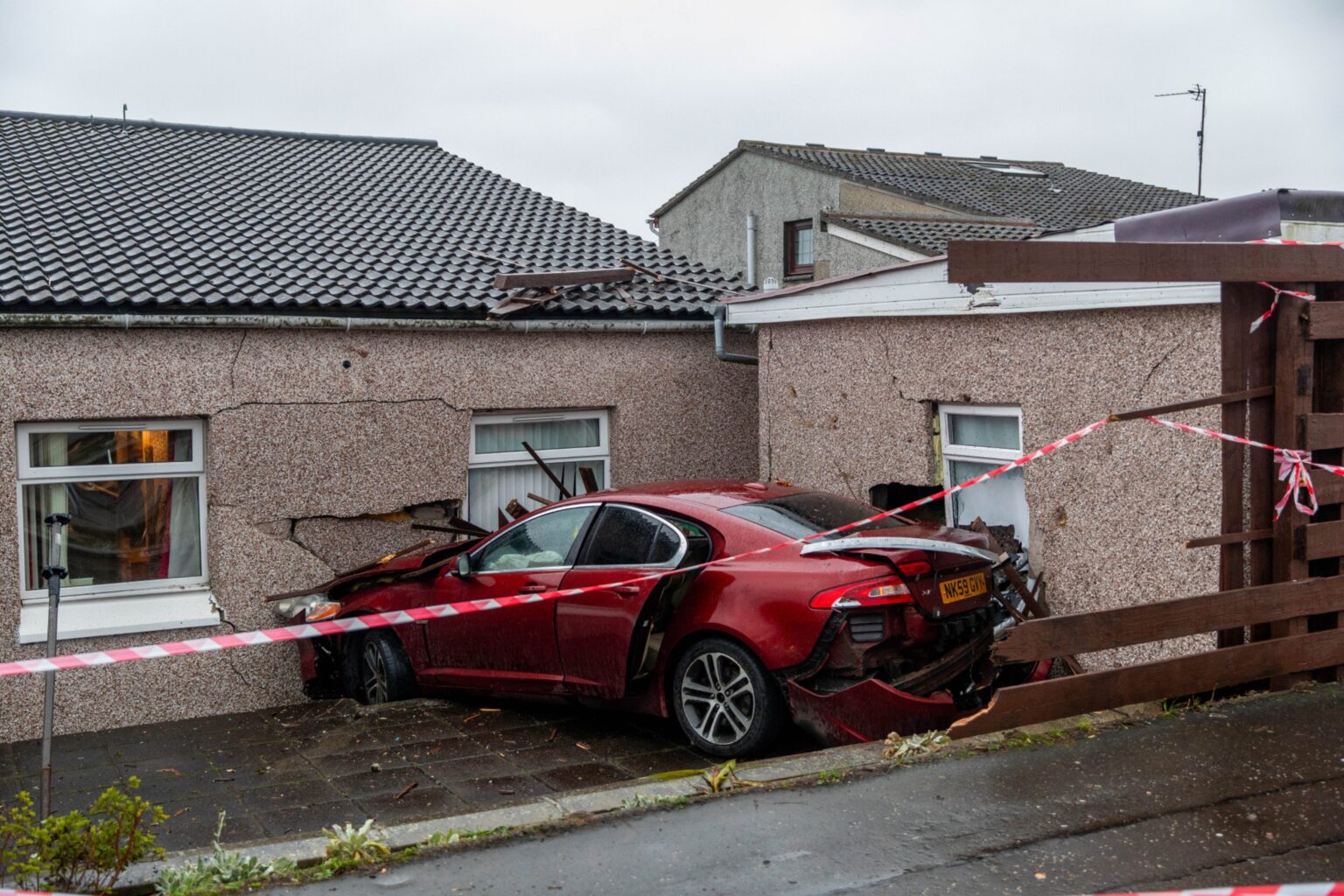 Driver charged after vehicle crashes into house on Dundee street