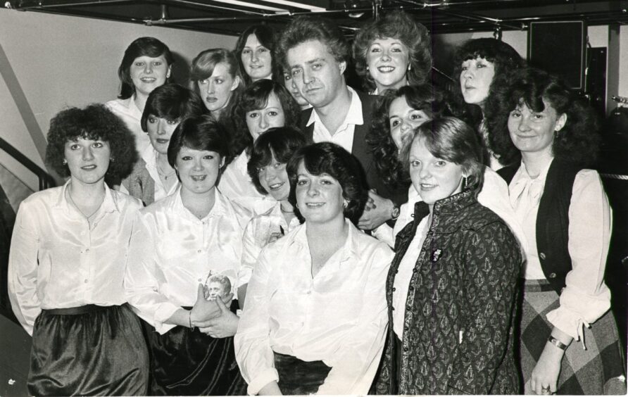 Nicholas Ball with Top Shop staff.