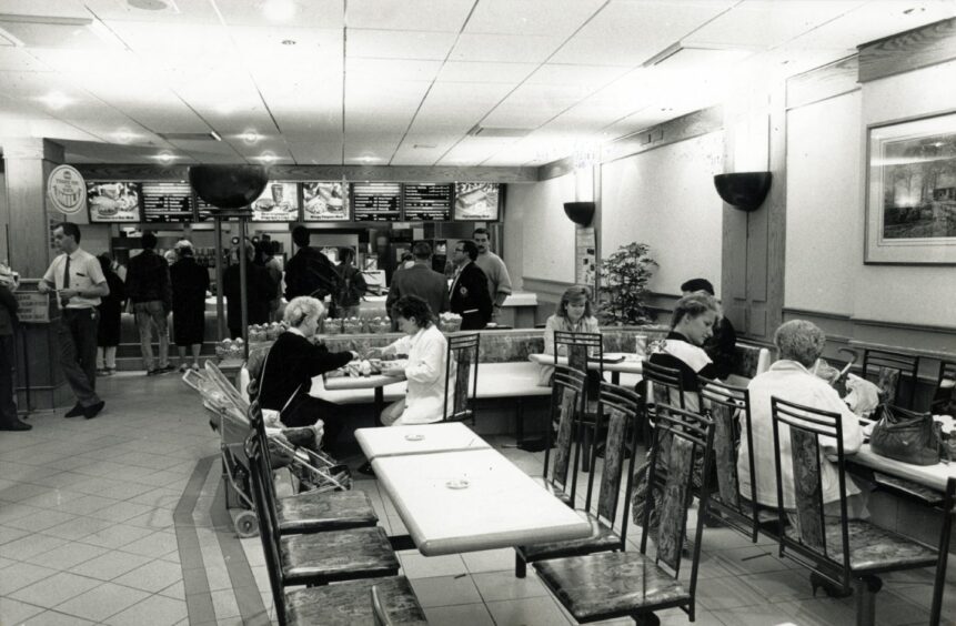 Customers enjoying Wimpy food in September 1988