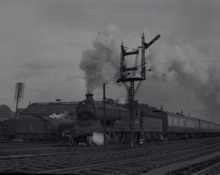 A train heads down the tracks in Dundee.