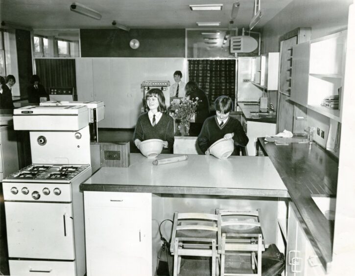 Pupils from Lawside Academy cooking in the domestic science room in May 1966
